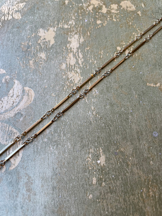 Collana a bastoncini in argento dorato, anni ‘50