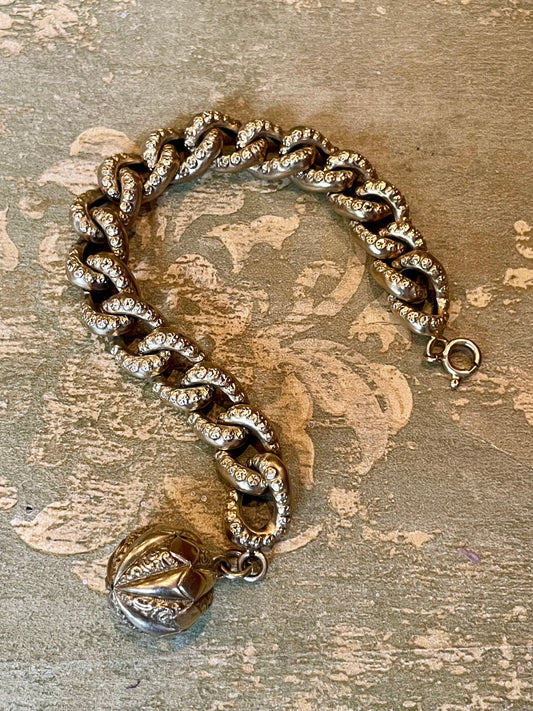 Eccezionale bracciale gourmette con charms, anni ‘40/50