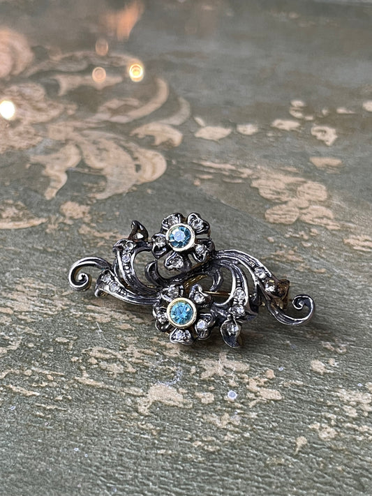 Romantica spilla in argento con tralcio di fiori, anni ‘50