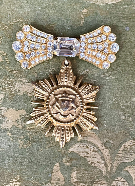 Spilla Onoreficenza con fiocco in strass, anni ‘80